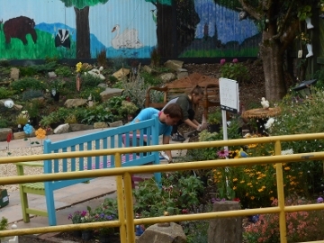 A photograph of people gardening in the sensory garden at the Hungerford Resource Centre