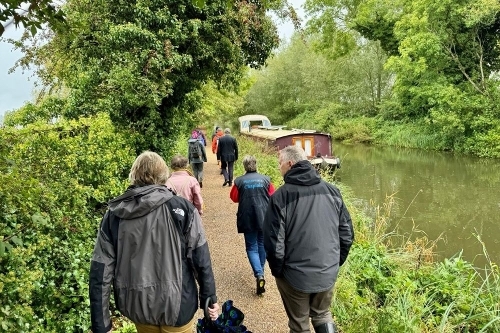 Stakeholders seeing the recently-upgraded towpath between Aldermaston Wharf and Ufton Lane -  courtesy of Greenham Trust