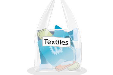 A clear plastic bag with textiles in it. On the front is the word 'Textiles'.