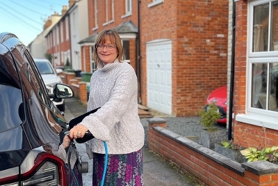 16 Powering up progress woman charging car