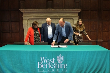 Tim Parry, CEO of Connecting Communities in Berkshire, signing the Memorandum of Understanding.